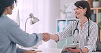 Medical, tablet and doctor shaking hands with a patient in the office of a hospital for healthcare agreement. Handshake, trust and thank you with a medicine professional meeting a woman in a clinic