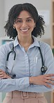 Healthcare, woman or doctor with smile for arms crossed in confidence in medicine, wellness or surgery. Medical professional, caregiver or nurse for pride on face for career with vision in cardiology