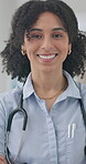 Doctor, face and woman with stethoscope or smile for healthcare, career and professional service or job. Medicine, portrait and person in cardiology, medical work or employee with support and trust