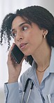 Doctor, woman and phone call with talking in clinic for healthcare, communication and contact in office. African medic, smartphone and telehealth consultation for advice, wellness or care at hospital