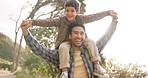 Father, son and outdoor on shoulders for plane games, laughing or bonding for love, care or sunshine. Man, boy child and airplane with freedom, balance or excited together in park, garden or backyard