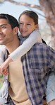 Piggyback, love and father with girl child in a park happy, bond and having fun outdoor together. Family, support and parent with kid in nature for back ride, freedom and conversation on weekend trip