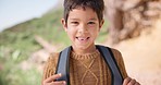 Smile, face and boy on a hike with backpack in nature on a mountain for outdoor travel holiday. Happy, excited and portrait of child or kid on an adventure, vacation or weekend trip in countryside.