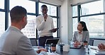 Business, black man or leader in meeting to report proposal of project ideas, presentation or team discussion in office. Manager, workshop or planning feedback of results in seminar for collaboration