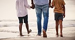 Holding hands, legs of family on beach together for holiday and bonding on tropical adventure from back. Walking, summer vacation and father with children at ocean to relax, travel and fun in Cancun.