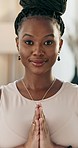 Face, yoga and meditation with a black woman on the floor of a living room in her home for health or wellness. Portrait, smile and mental health with a young person in her apartment for mindfulness