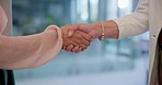 Business people, handshake and meeting in partnership, b2b or agreement for deal at office. Closeup of employees shaking hands for teamwork, unity or introduction in hiring or recruiting at workplace