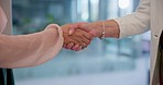 Business people, handshake and meeting in partnership, agreement or b2b for deal at office. Closeup of employees shaking hands for teamwork, unity or introduction in hiring or recruiting at workplace