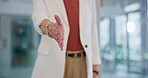 Business woman, handshake and office for deal, b2b or agreement in hiring, meeting or greeting. Closeup of female person shaking hands for recruiting introduction, teamwork or thank you at workplace