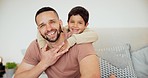 Happy, face and father with a child hugging on the bed for relaxing, bonding or resting together at home. Smile, family and portrait of young dad embracing with boy kid in the bedroom at house.