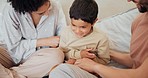 Happy, bed and parents tickling kid at their home having fun and bonding together on a weekend. Smile, playful and young mother and father playing with boy child in bedroom of modern house in Canada.