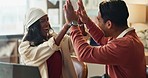 Small business, laptop and business people high five in office for ecommerce, startup or success. Happy, celebration and supply chain team with hands together in support of review, feedback or growth