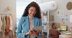 Fashion designer, typing and business woman on tablet, research and planning ecommerce in creative startup. Technology, happy tailor and worker on internet, reading email and adjust glasses at store