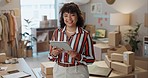 Happy woman, tablet and boxes in small business management, supply chain or logistics at boutique. Portrait of female person or fashion designer smile with technology for online stock or startup