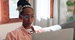 African woman, laptop and sofa for remote work from home with glasses, reading or analysis for crypto trading. Entrepreneur, investor and trader with thinking, ideas or stock market research in house