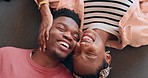 Above, floor and happy couple laughing, relax and playful with eyes closed at home together. Top view, love and face of black people in a living room with joke, conversation and romance in a house