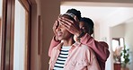 Black couple cover eyes for surprise hug, home romance and bond with husband, wife or marriage partner care. Romantic love, happiness and African woman, man or hugging people looking at window view