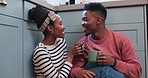 Kitchen, tea cup and happy black couple bond, wellness and chat about love, romance or relationship support, care and trust. Home, relax morning and people talk about latte, espresso or cacao drinks