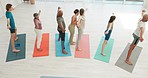 Yoga, instructor or people stretching in class for wellness, peace or balance with group in studio. Diversity, top view or coach teaching pilates pose for chakra energy, health or holistic healing