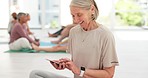 Smart watch, meditation and senior woman with a smartphone, yoga and smile with progress, health and fitness. Old person, happy pensioner and mature lady with a cellphone, check time and exercise