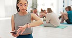 Cellphone, meditation and woman with smart watch, yoga and exercise with fitness, health and relax. Person, chakra and girl with wellness, mobile user and peace with progress, challenge and internet