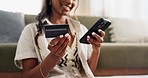 Woman, hands and phone with credit card for online shopping, payment or transaction in living room at home. Closeup of female person on mobile smartphone with debit for purchase, buying or ecommerce