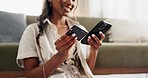 Woman, hands and phone with credit card for ecommerce, payment or transaction in living room at home. Closeup of female person on mobile smartphone with debit for purchase, buying or online shopping