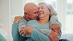 Senior couple, hug and love in bedroom, care and conversation together at home. Embrace, elderly man and happy woman in bed, romance and connection for support, relationship or commitment to marriage