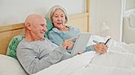 Old couple on bed with tablet, phone and reading social media meme, post and relax in home together. Digital app, old man and woman in bedroom checking email, website or online with love in marriage.