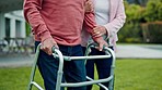 Walker, senior couple and outdoor with physical therapy and help with retirement and marriage. Wellness, guide and elderly woman and man together with love and care with mobility issue after surgery