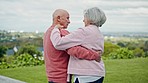 Mature, couple and together while dancing outside in garden for romance. Senior man, woman and married while talking with love in relationship with trust, support and care for retirement on holiday