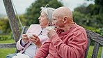 Love, coffee and old couple on bench in garden, morning bonding chat and relax together in retirement. Marriage, senior man and woman on swing in backyard with drink, talk and care in conversation.
