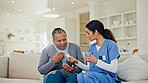 Senior care, old woman and caregiver on sofa with medicine, help and homecare in living room. Retirement, healthcare and elderly person and nurse, pills and water for medical advice on couch together