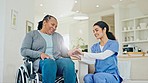Nurse, woman in wheelchair and holding hands for support, conversation and help. Mature person with a disability, caregiver comfort and smile, listen and rehabilitation for medical healthcare in home