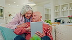 Old couple, hug and relax with tablet on sofa, healthy relationship with tech and streaming. Life partner, trust and love with communication, people at home with connectivity, online and retirement