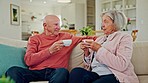 Drinking coffee, senior couple and living room with marriage, conversation and relax on a sofa. Discussion, tea cup and elderly people together in retirement with love and care in a home with drink