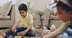 Family, play or children on carpet with toys for creative fun or bonding as siblings at home together. Development, smile or kids enjoy building block games to relax with mom or dad on couch or sofa