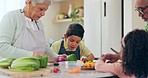 Mature, woman and child for teaching to cook in kitchen by cutting ingredients in preparation of vegan dinner. Mexican family, grandmother and boy for bond, together or quality time with help in home