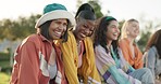 Happy woman, friends and laughing for funny joke, social or meme in relax at outdoor park together. Group of female people or students smile, chilling and laugh in joy for friendship in nature
