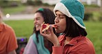 Happy woman, friends and eating pizza or fast food at park, picnic or lunch get together in nature. Hungry female person or people smile and enjoying meal, snack or dinner on grass or outdoor field
