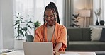 Black woman, typing in home office and laptop for research in remote work, social media or blog in apartment. Freelance girl at desk with computer writing email, website post and online chat in house