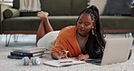 Black woman on floor, budget and relax at laptop for remote work, finance and accounting with smile in living room. Happy girl on carpet with computer, calculator and checking online student loan.