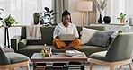 Black woman on couch, relax or typing on laptop in remote work, social media or blog post research with smile in home. Happy girl on sofa with computer checking email, website or online chat in house