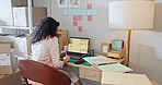 Woman, boxes and writing with coffee by laptop, reading and start morning with drink for energy. Small business owner, cardboard package and notes with tea cup, computer and vision for strategy idea