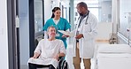 Doctor, nurse and patient in wheelchair with documents for support, care or life insurance at hospital. Surgeon, team or medical professional with caregiver helping person with a disability at clinic