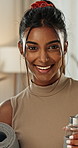 Face, fitness and woman with a water bottle, smile and relax with confidence, vitality and hydration. Portrait, person and athlete with a mat, liquid and thirsty with workout, sweating and happiness