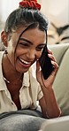 Woman, phone call and laughing at funny joke, story or communication on home living room sofa. Smile, happy or Indian gen z student talking on mobile technology for networking, gossip or conversation