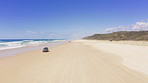 Takking a drive on the beach