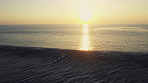 Surfing at sunset has to be the best feeling