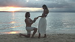 Propose on the beach, she's bound to say yes